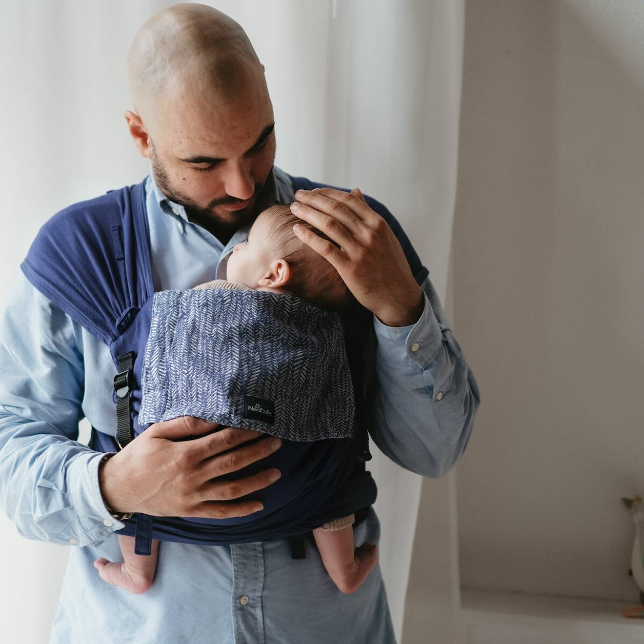 Porte-bébé p'tit evo, plume indigo