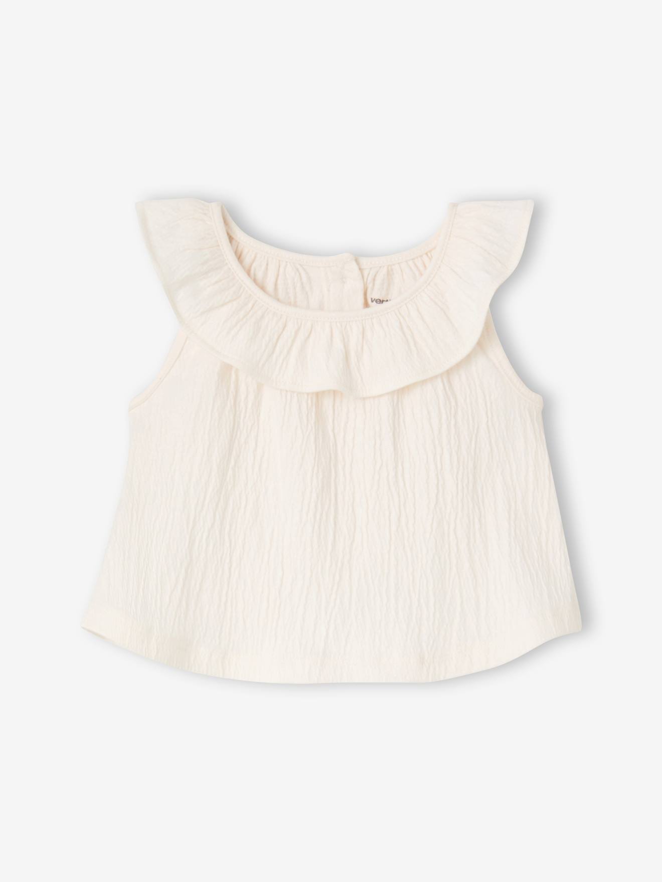 T-shirt sans manche bb fille cru 6 €