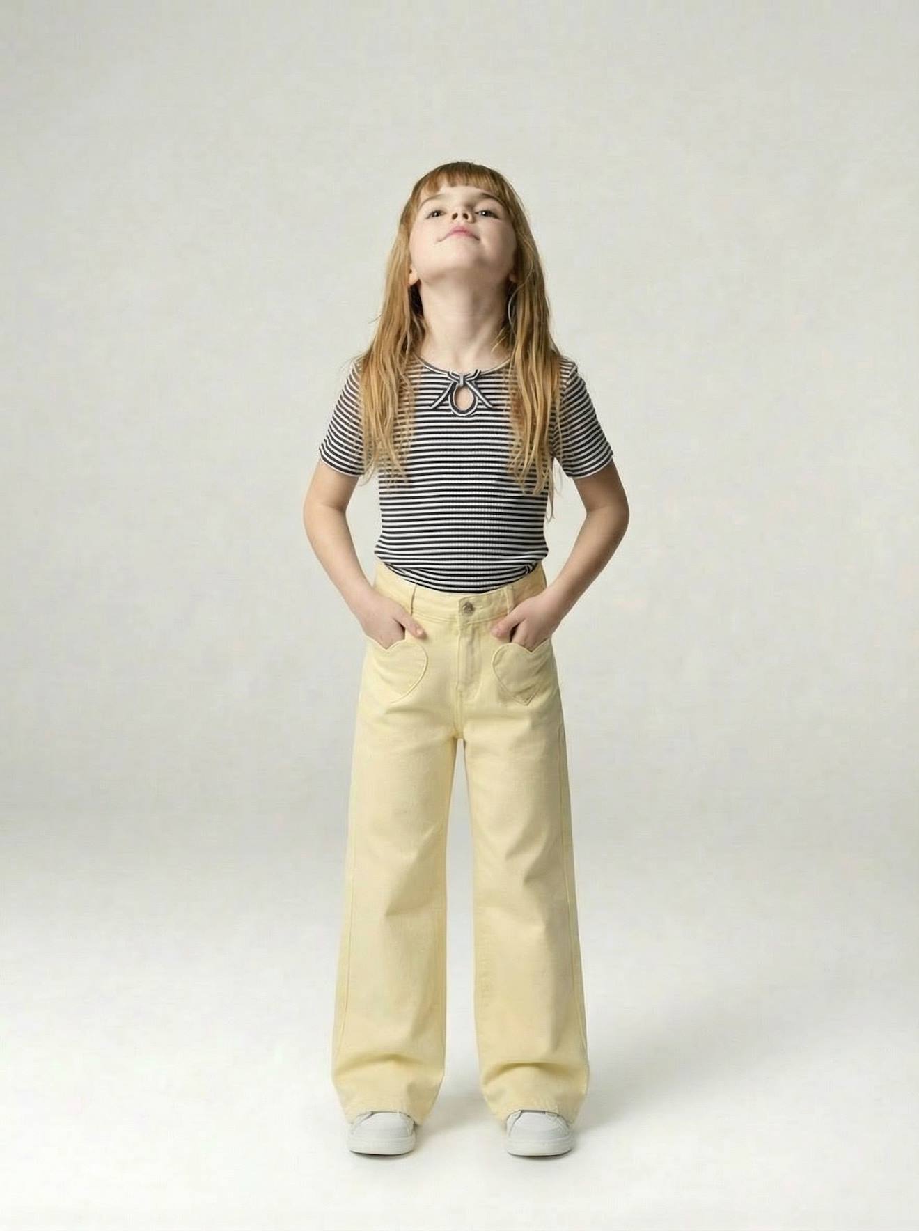 Pantalon large fille poches cœur jaune pâle