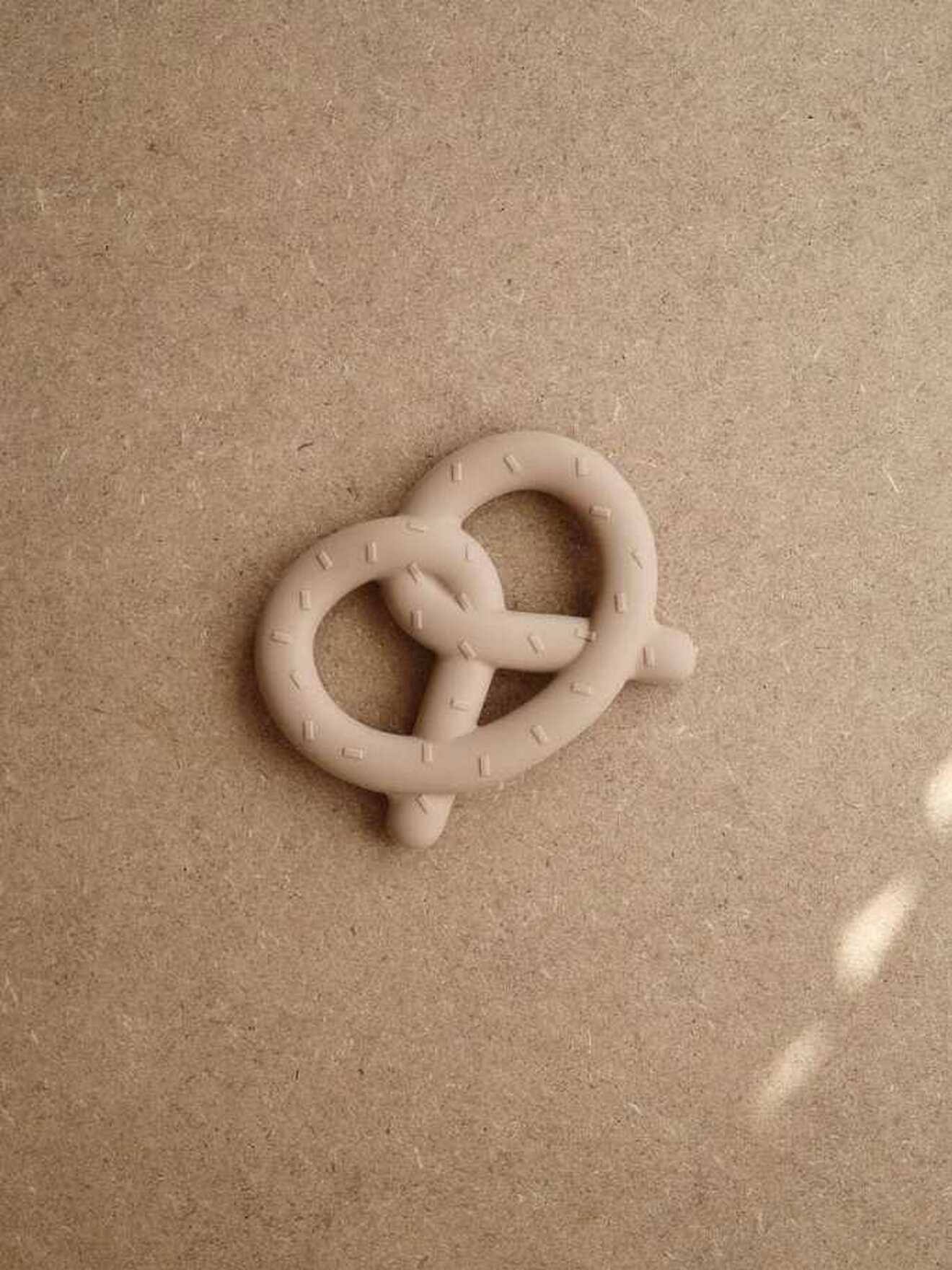 Anneau dentition bretzel marron