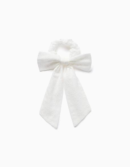 Bébé-Chouchou avec nœud en broderie anglaise