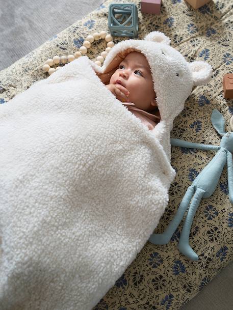 Bébé-Nid d'ange transformable en tapis à langer peluche 