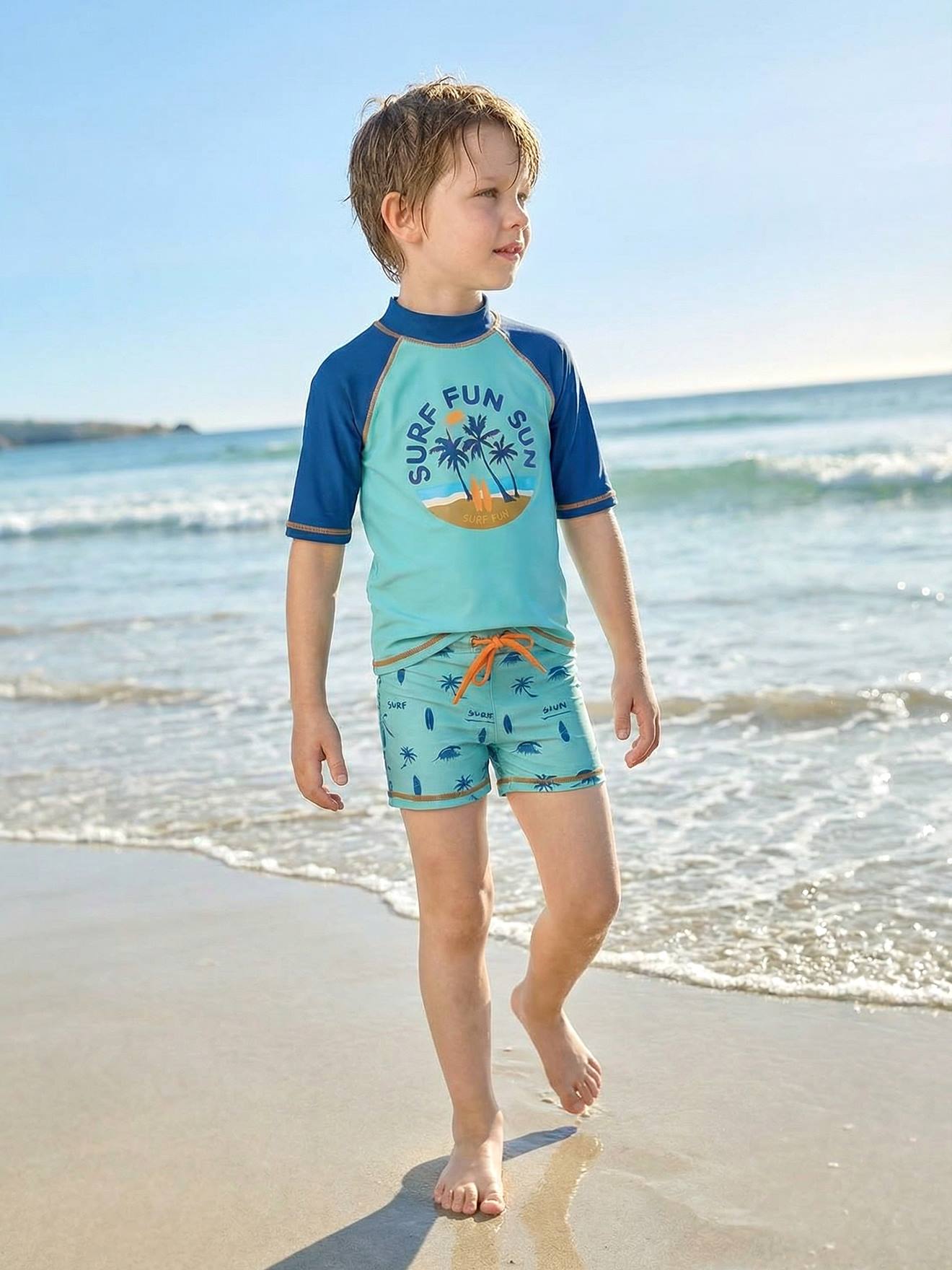 Ensemble de bain garçon T-shirt anti-UV + short bleu turquoise/pétrole