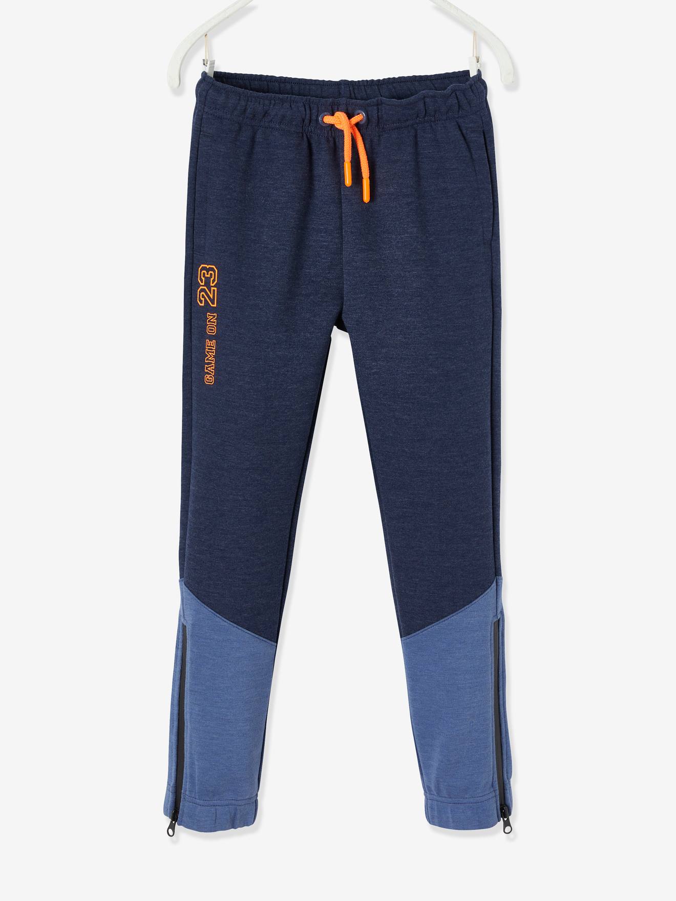 Pantalon de sport garçon en matière technique détails fluo bleu