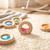 Hochet sensoriel donut calme Bleu+Jaune+Orange+Rose+Rouge+Turquoise+Vert+Violet 15 - vertbaudet enfant 