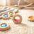 Hochet sensoriel donut calme Bleu+Jaune+Orange+Rose+Rouge+Turquoise+Vert+Violet 12 - vertbaudet enfant 