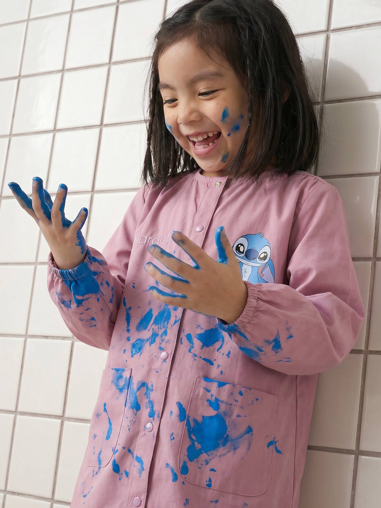 Tablier Lilo et Stitch fille violet 16€