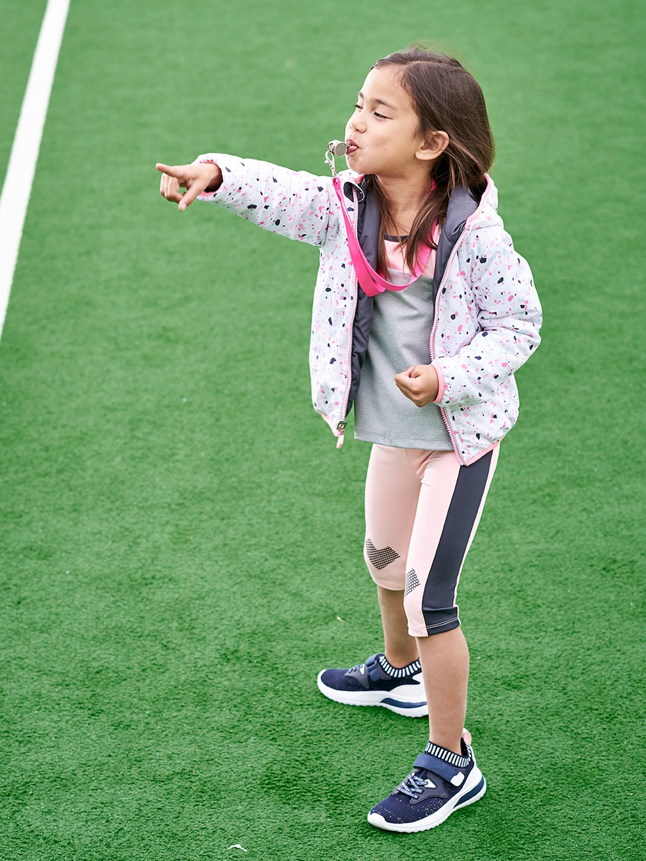 Legging de sport mi- mollet fille en matière technique rose pâle
