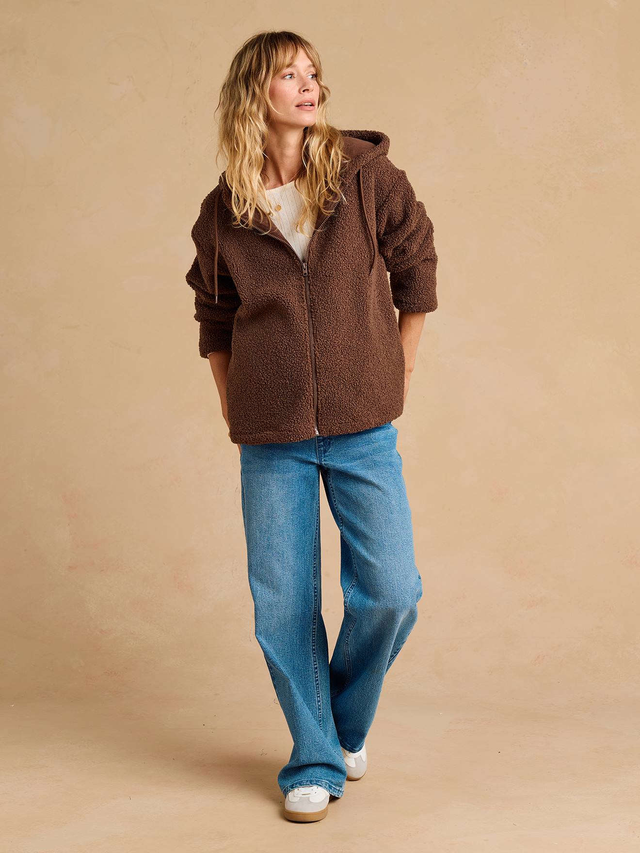 Sweat zipp en sherpa volutif avec protge bb taupe 56 €