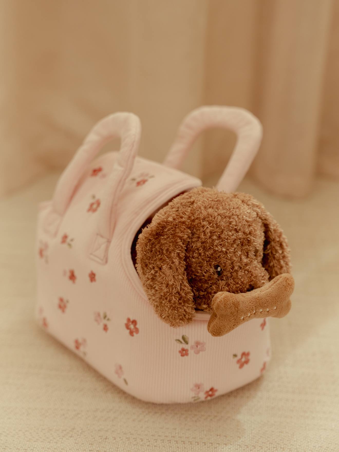 Peluche chien Jackie en sac rose