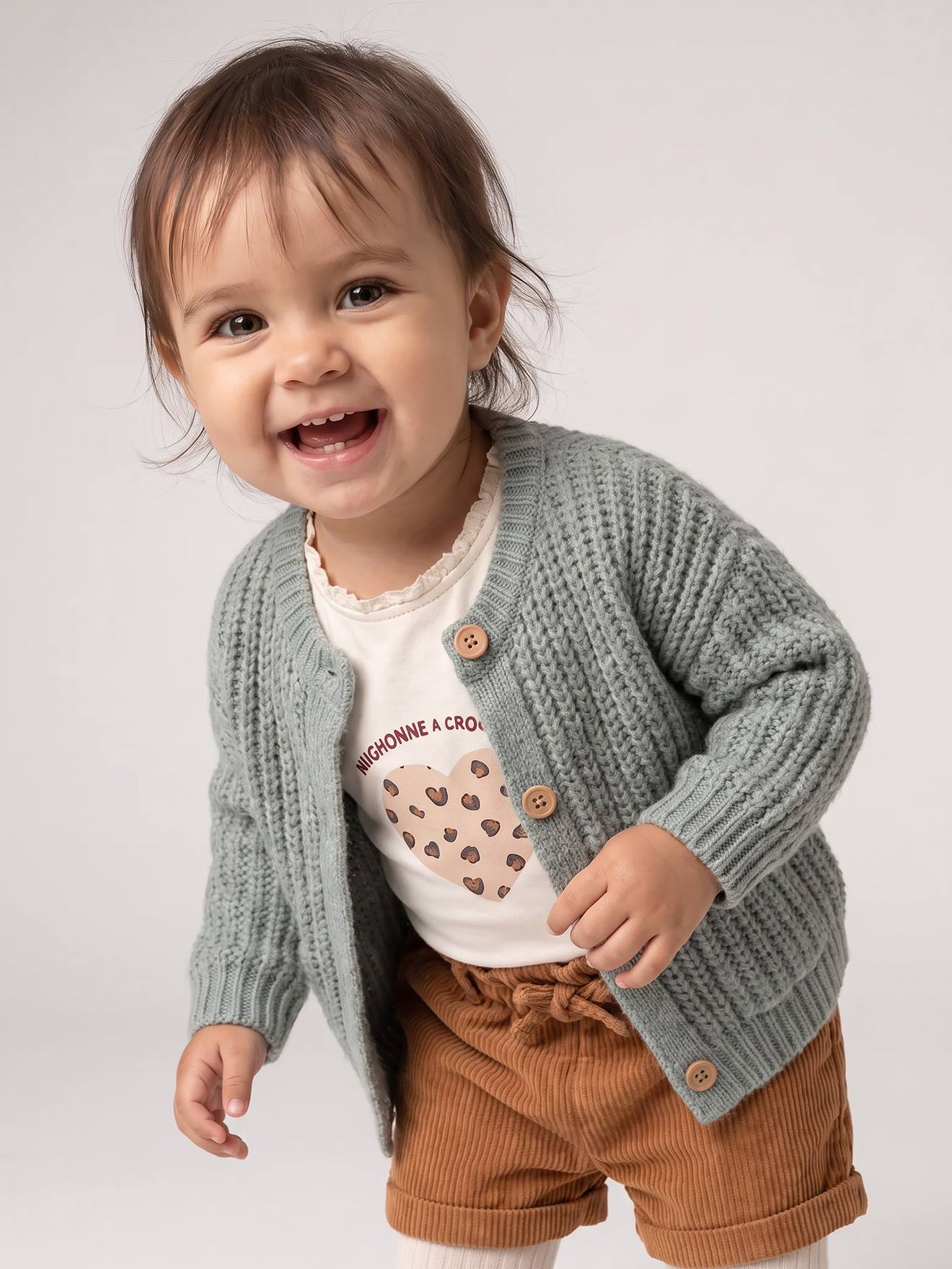 Gilet bébé en maille grosse jauge vert sauge