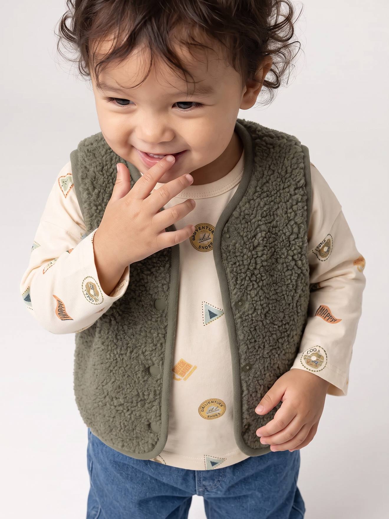 Gilet bébé sherpa à pressions vert