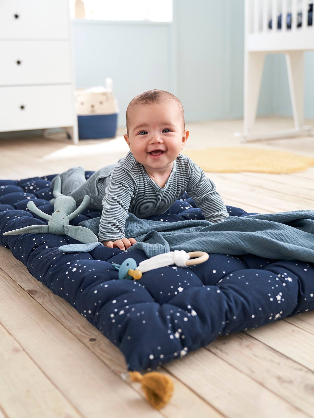 Matelas de sol avec pompons bleu foncé