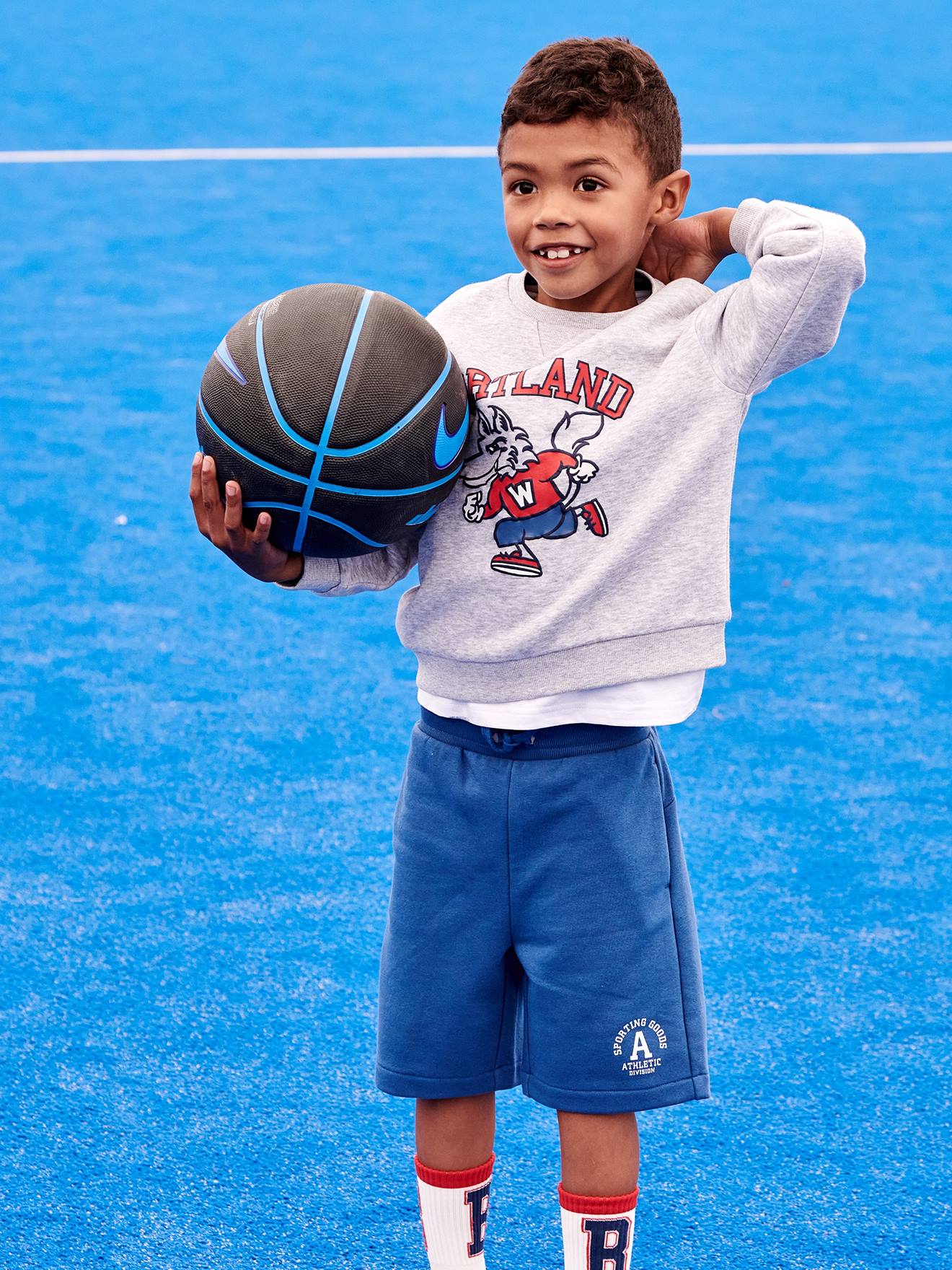 Short sport garçon en molleton bleu roi