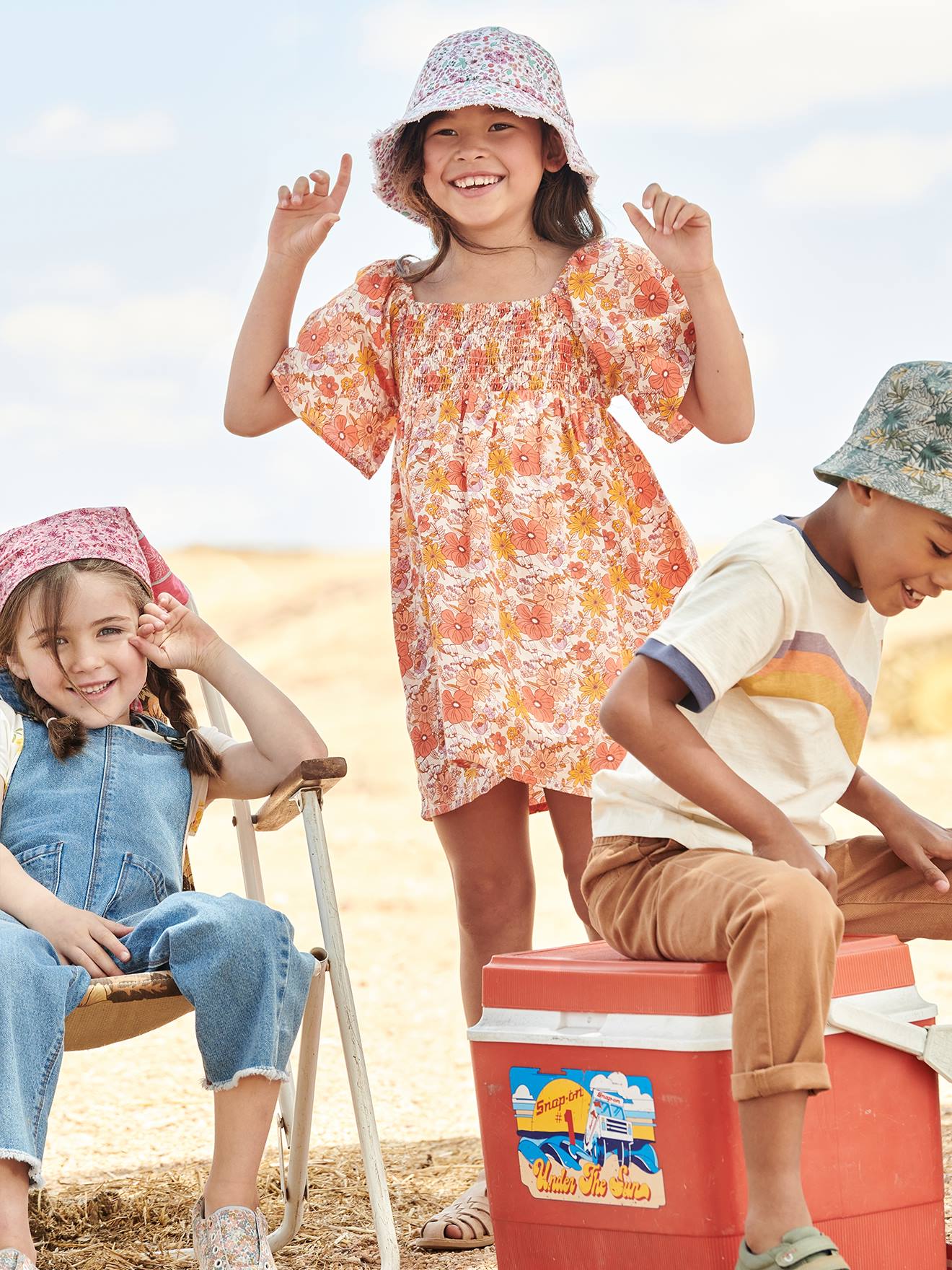 Robe à smocks imprimée fleurs fille rose nude