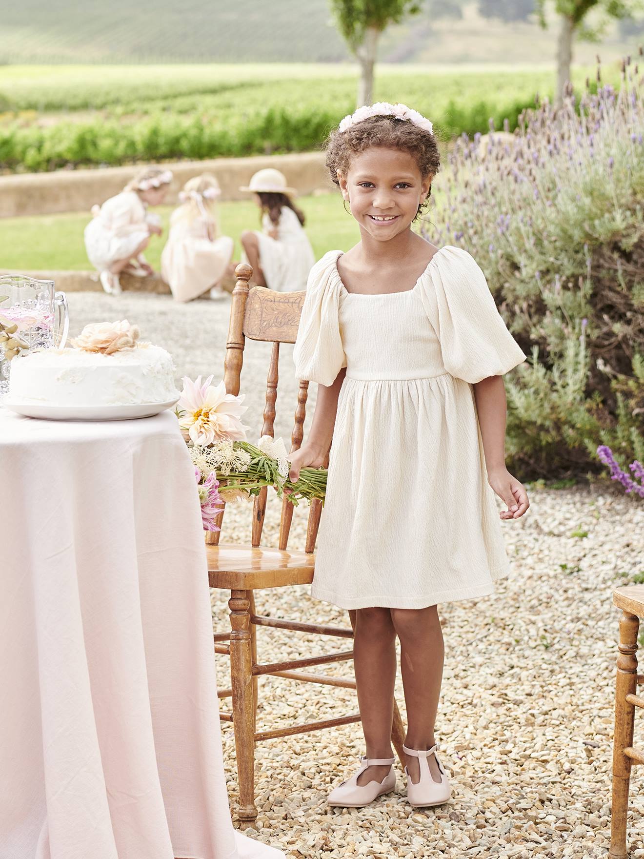 Vertbaudet - Robe cérémonie smocks dos fille en tissu reliéfé vanille