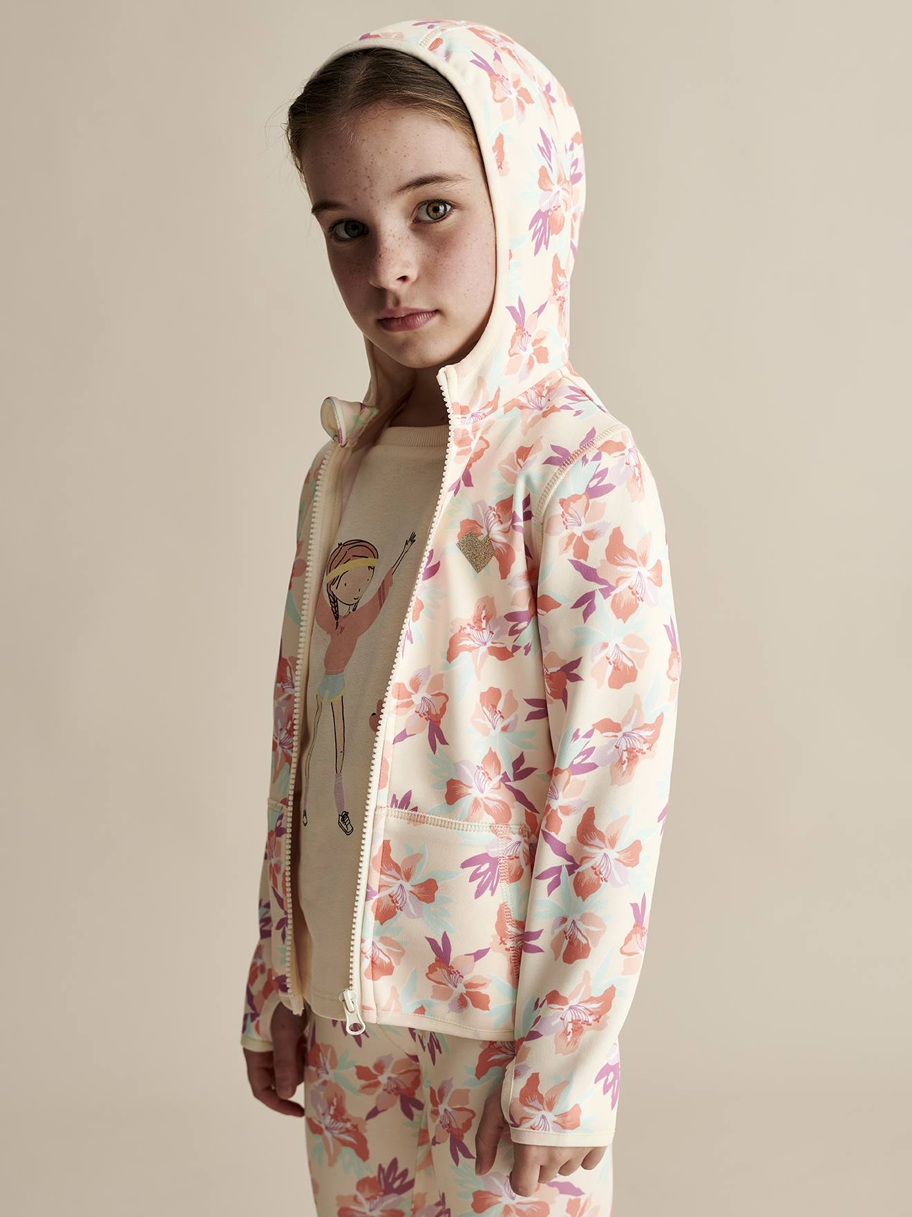 Sweat sport zippé matière technique fille motifs fleurs multicolore