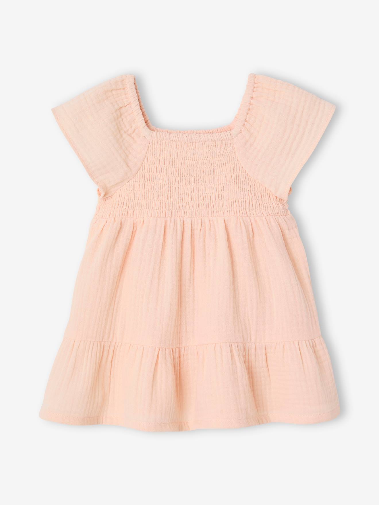 Robe bébé smockée en gaze de coton abricot poudré
