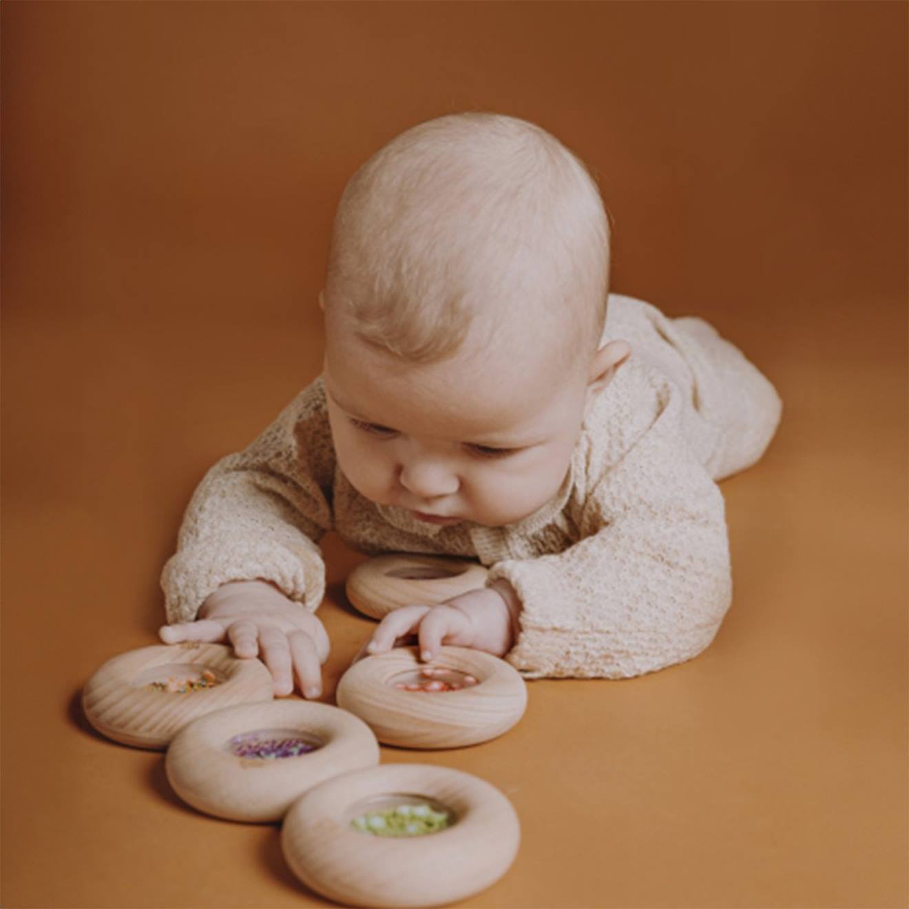 Hochet Sensoriel Donut Fruits Violet (Petit Boum) - Image 1