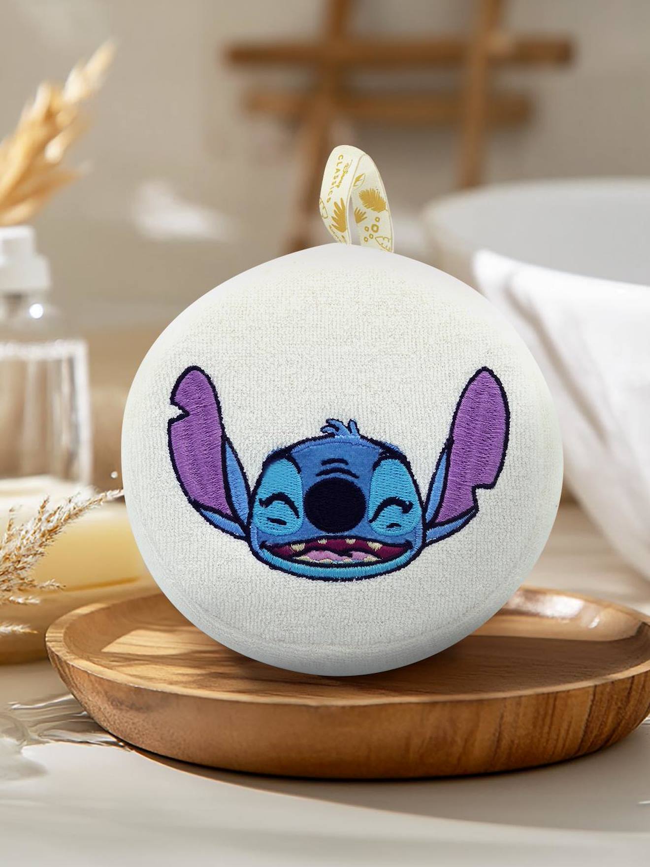 Eponge bébé Disney brodée tête de Stitch écru
