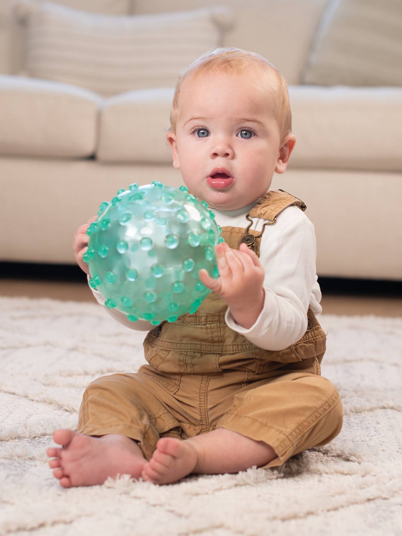 Balle sensorielle translucide multicolore