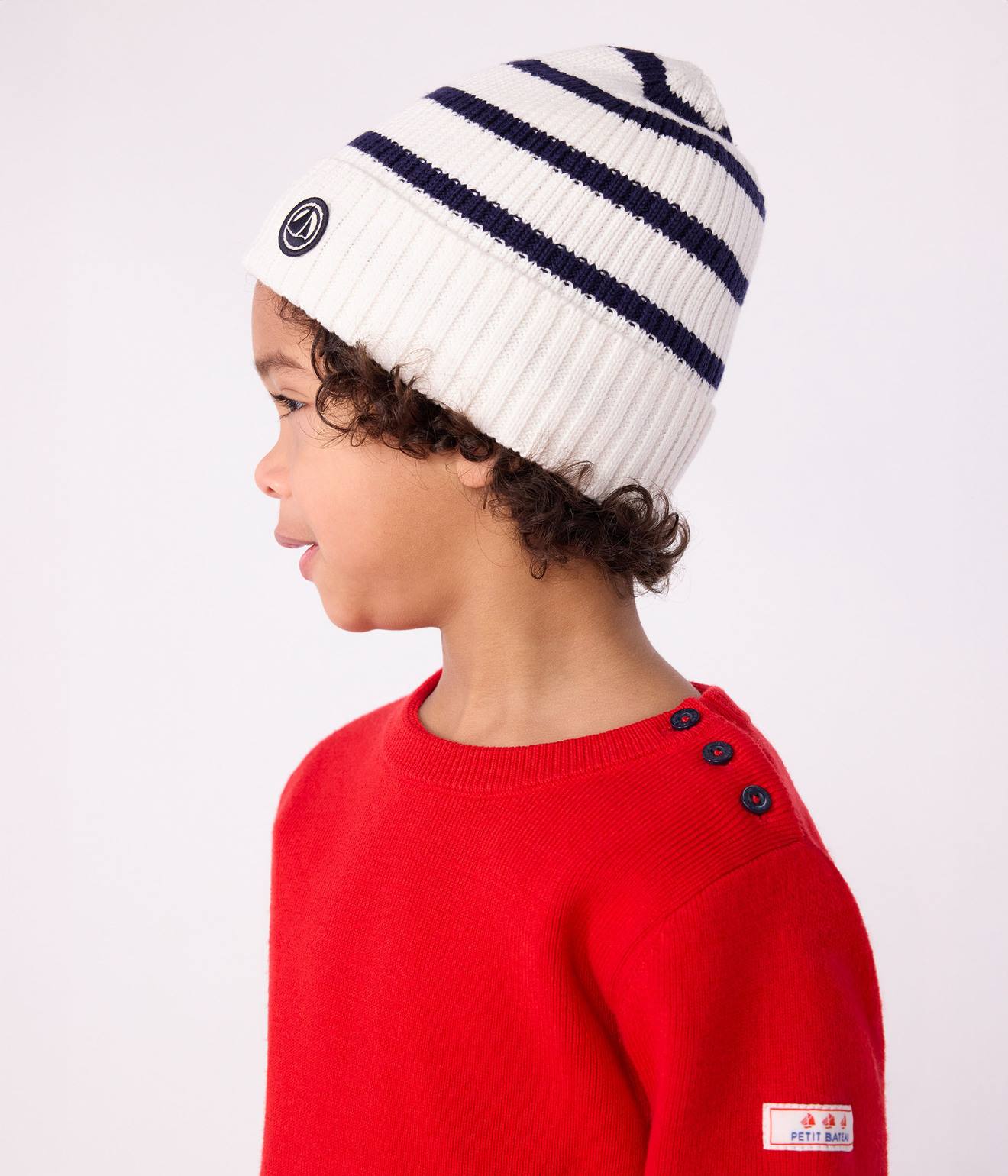 Bonnet enfant rayé en tricot doublé polaire marine